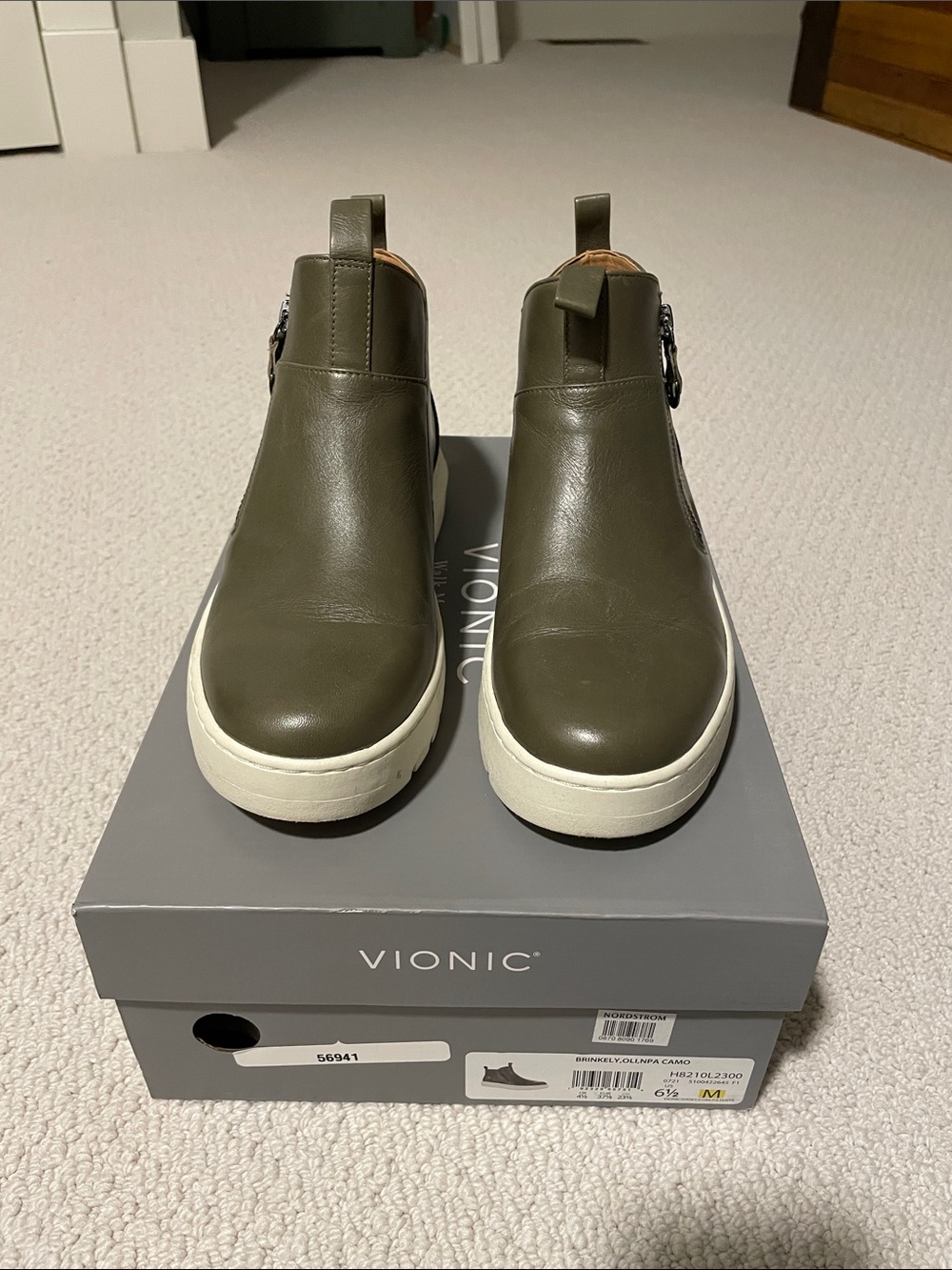 Ankle-height zip up boots with sneaker sole